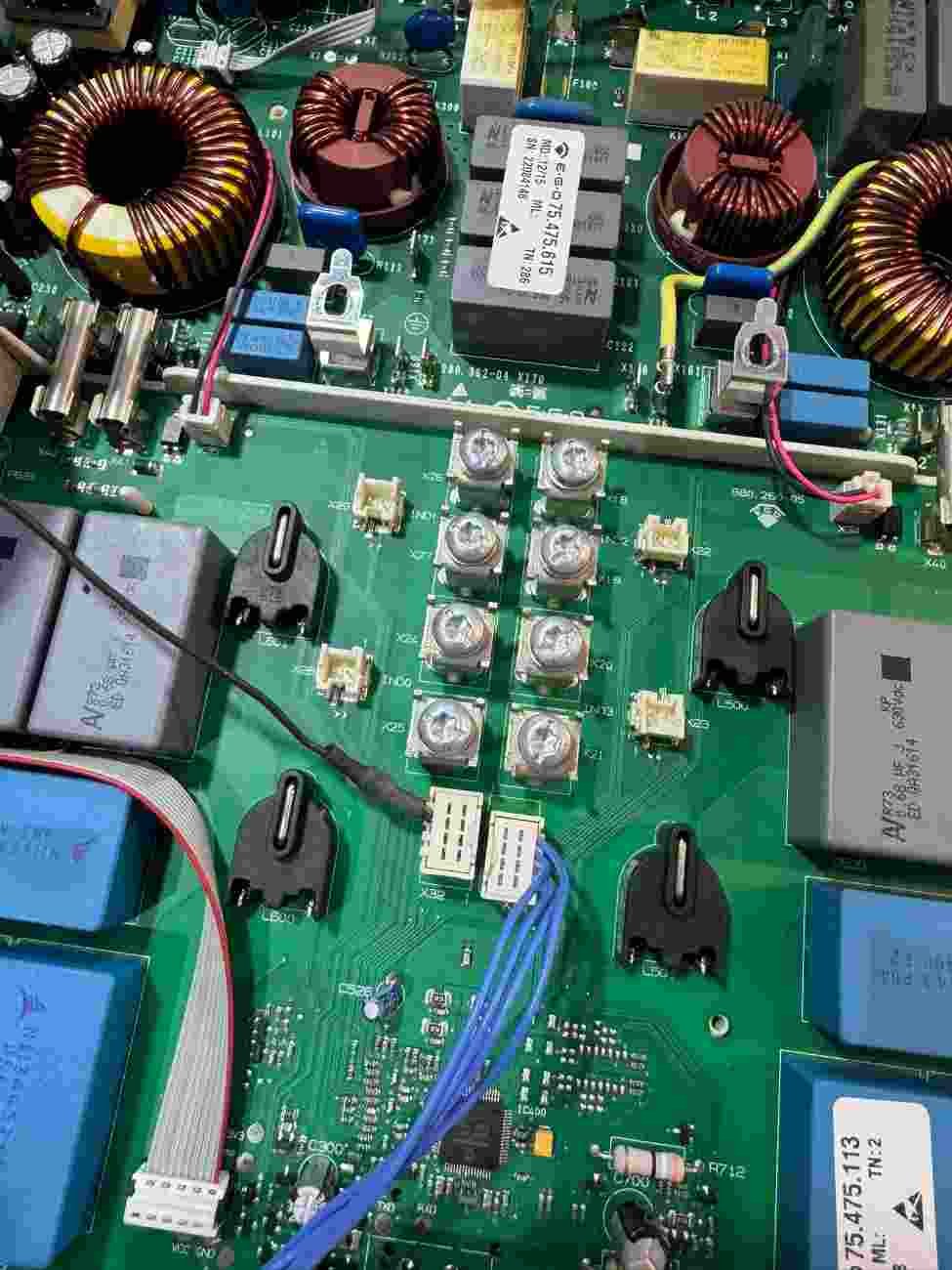Close-up of appliance control board component repair